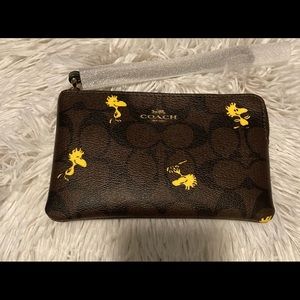 Coach Peanuts Woodstock Wristlet